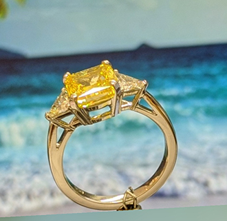 2 carat Cushion, fancy vivid yellow